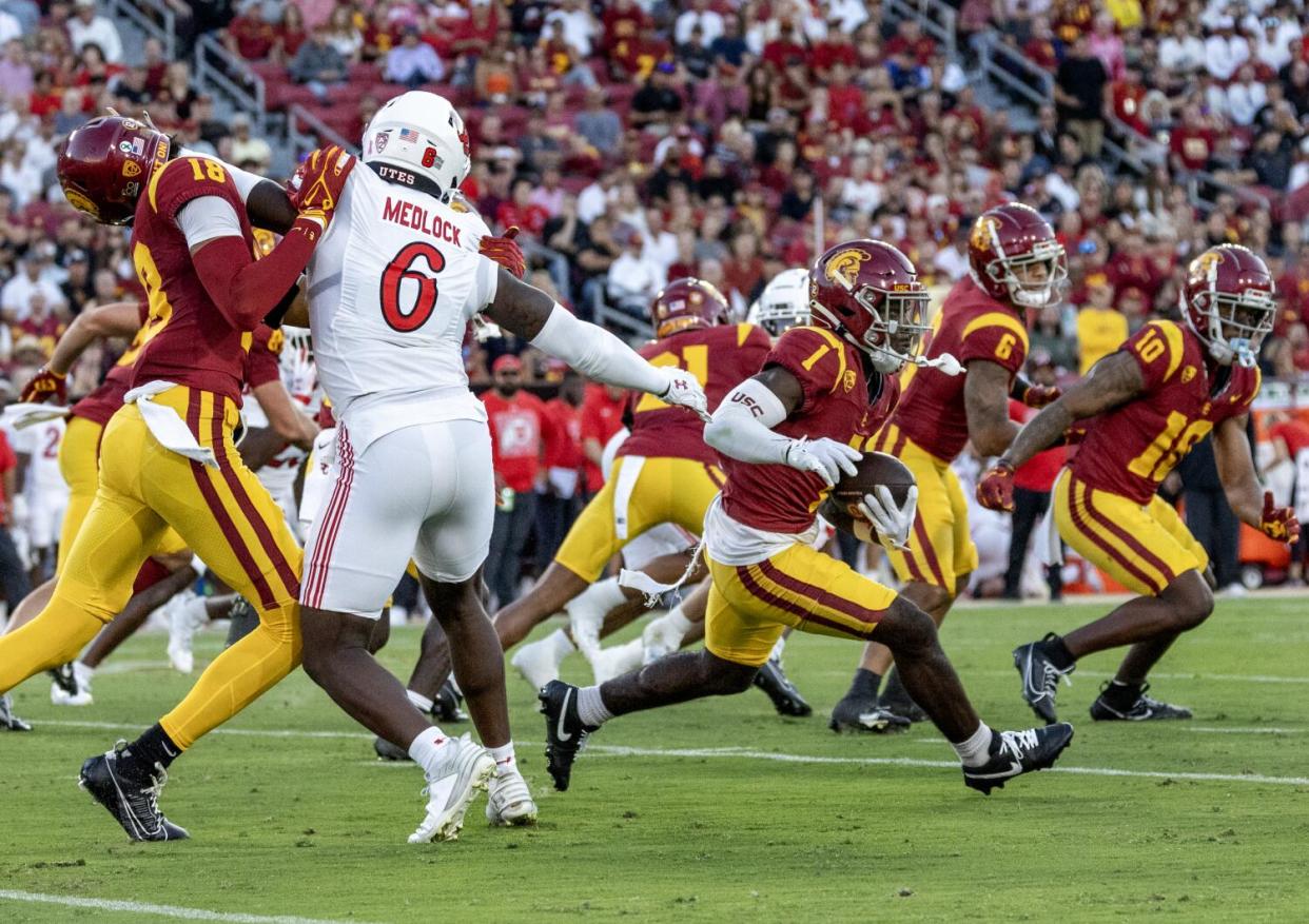 USC receiver Zachariah Branch cuts across the field.