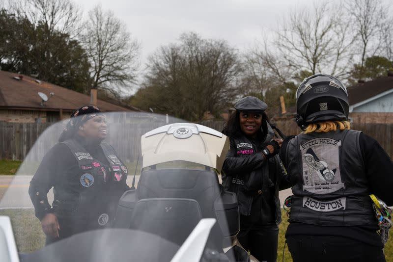 The Wider Image: 'I just ask God to help me': Texas funeral home crushed by death as U.S. COVID toll nears 500,000