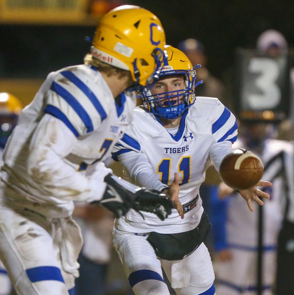 Chipley QB Neal Adams pitches the ball to Harrison Adkison during the Baker Chipley Regional Final football game played at Baker. The Gators season ended with a 22-7 loss as the Tigers advance to the state Final Four.