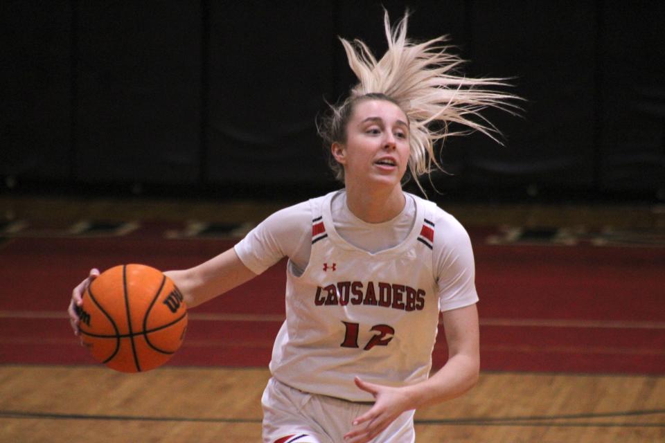 Bishop Kenny guard Sophia Rueppell (12) dribbles up the court during a high school girls basketball game against Orlando Jones on December 20, 2022. [Clayton Freeman/Florida Times-Union]