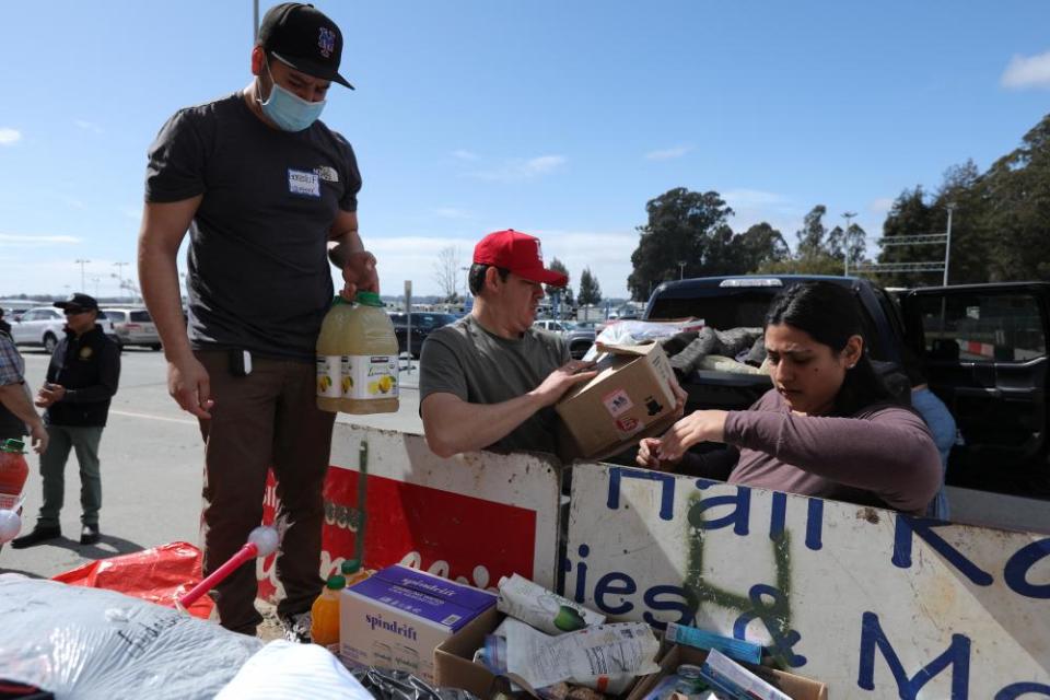 Melissa and Ossiel Urias collect donations for Pajaro River flood victims on 13 March.
