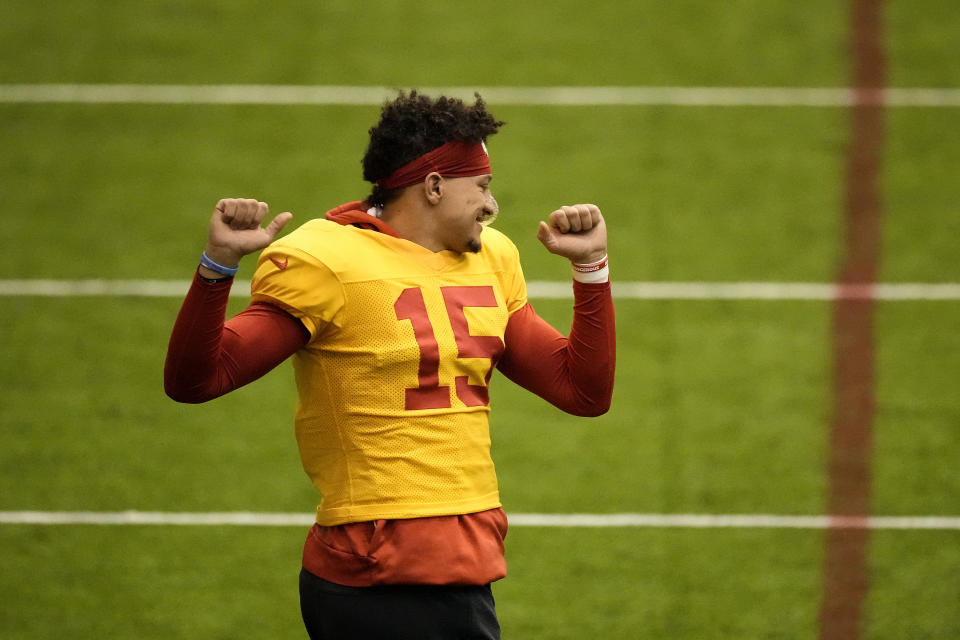 Kansas City Chiefs quarterback Patrick Mahomes stretches during the NFL football team's practice Wednesday, Jan. 24, 2024, in Kansas City, Mo. (AP Photo/Charlie Riedel)