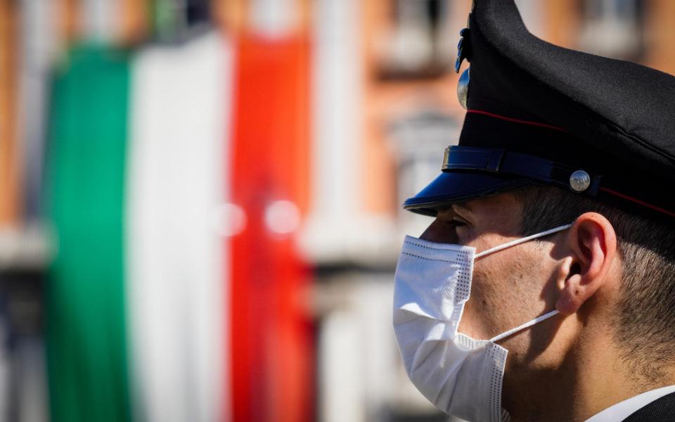 An Italian soldier wearing face mask - &nbsp;CESARE ABBATE/EPA-EFE/Shutterstock