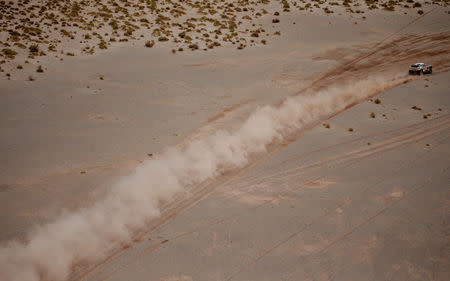 Dakar Rally - 2017 Paraguay-Bolivia-Argentina Dakar rally - 39th Dakar Edition - Fifth stage from Tupiza to Oruro, Bolivia 06/01/17. Stephane Peterhansel of France drives his Peugeot with his copilot Jean Paul Ottret. REUTERS/Ricardo Moraes