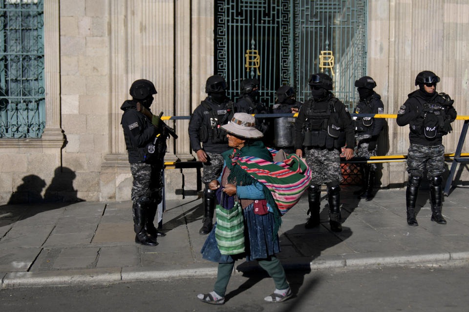 Police guard the government palace the day after a now-ousted Bolivian army chief led some soldiers to storm the building in La Paz, Bolivia, Thursday, June 27, 2024. The rebellion was short-lived as authorities arrested the general and his soldiers retreated. (AP Photo/Juan Karita)