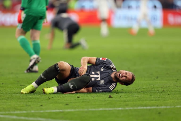 Bayern Munich forward Harry Kane was subbed off with an ankle injury in Saturday's 1-1 draw with Bayer Leverkusen (Alexandra BEIER)