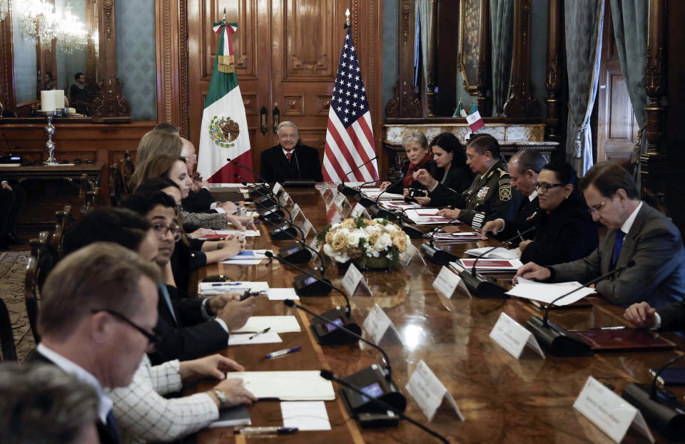 Mexican President Andres Manuel Lopez Obrador, center, at a meeting with U.S. Secretary of State Antony Blinken, U.S. Secretary of Homeland Security Alejandro Mayorkas and other officials on controlling migration, in Mexico City on Dec. 27, 2023.  / Credit: RODRIGO OROPEZA/AFP via Getty Images