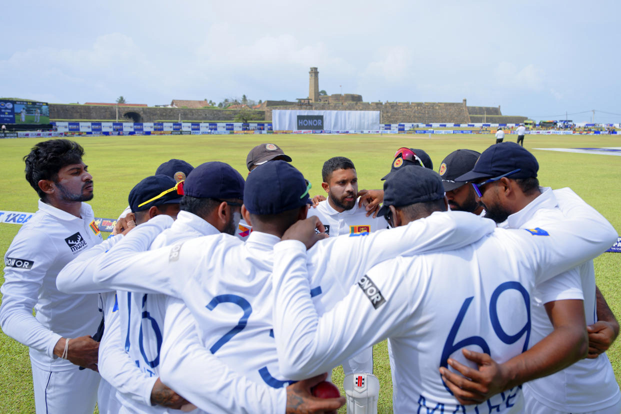 Sri Lanka's players form a huddle before the start of the game on the fifth and final day of the first cricket test match between New Zealand and Sri Lanka in Galle, Sri Lanka, Monday, Sept. 23, 2024. (AP Photo/Viraj Kothalawala)