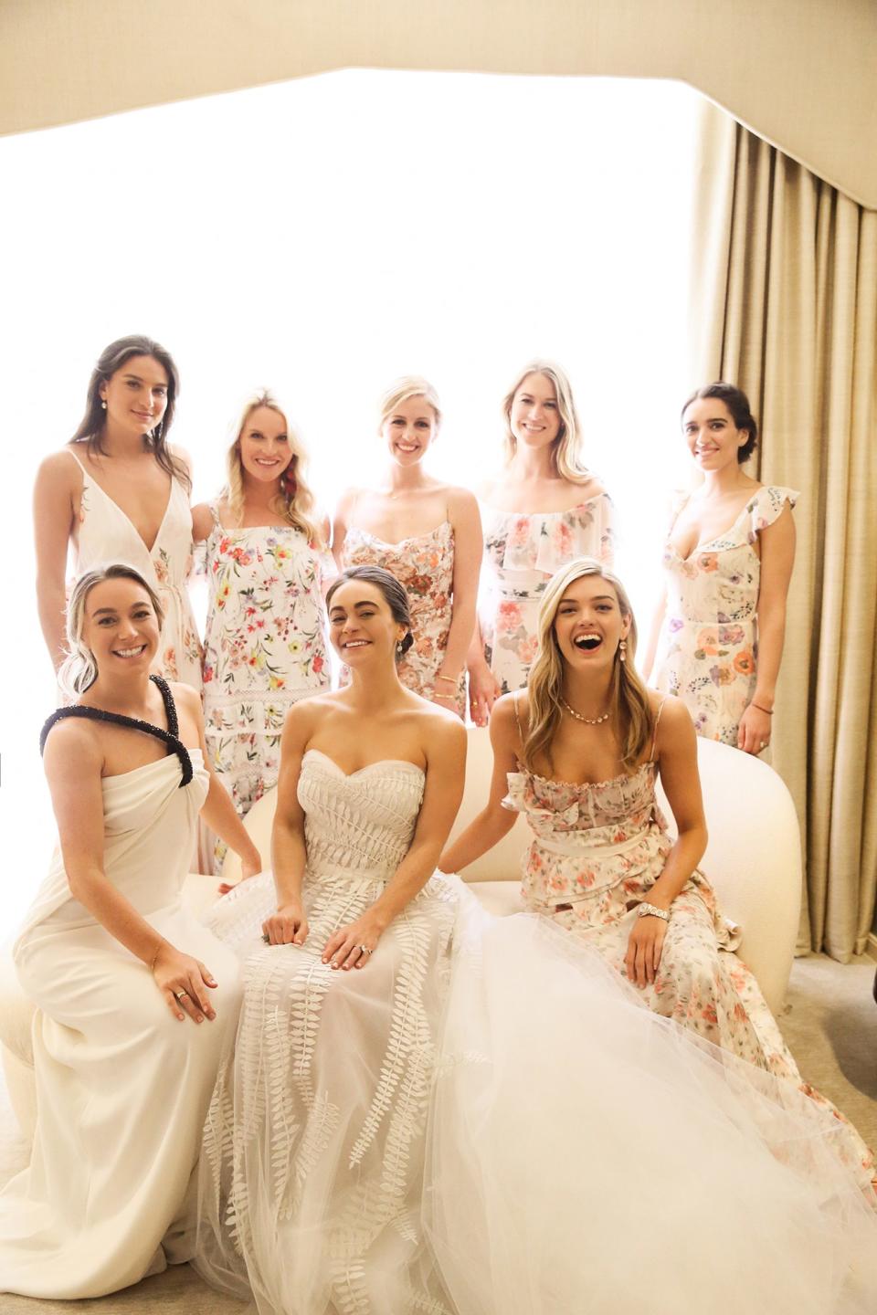 The bride wore Oscar de la Renta, inspired by her grandmother, for her greenery-filled ceremony at the Beverly Hills Hotel.