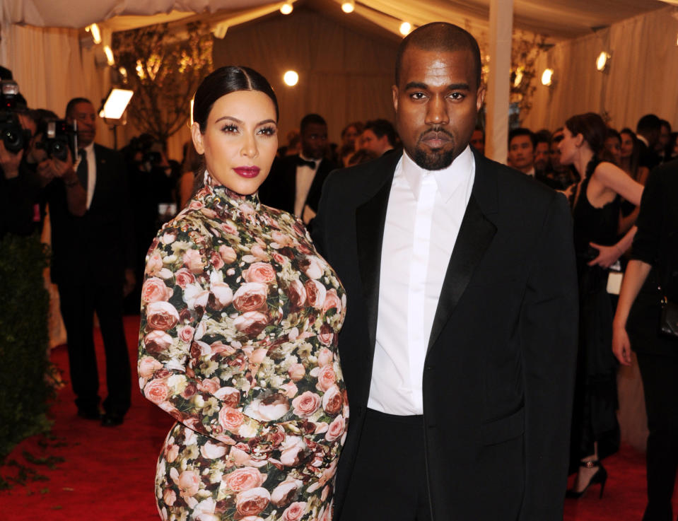 Kim Kardashian and Kanye West attend The Metropolitan Museum of Art's Costume Institute benefit celebrating "PUNK: Chaos to Couture" on Monday, May 6, 2013, in New York. (Photo by Evan Agostini/Invision/AP)