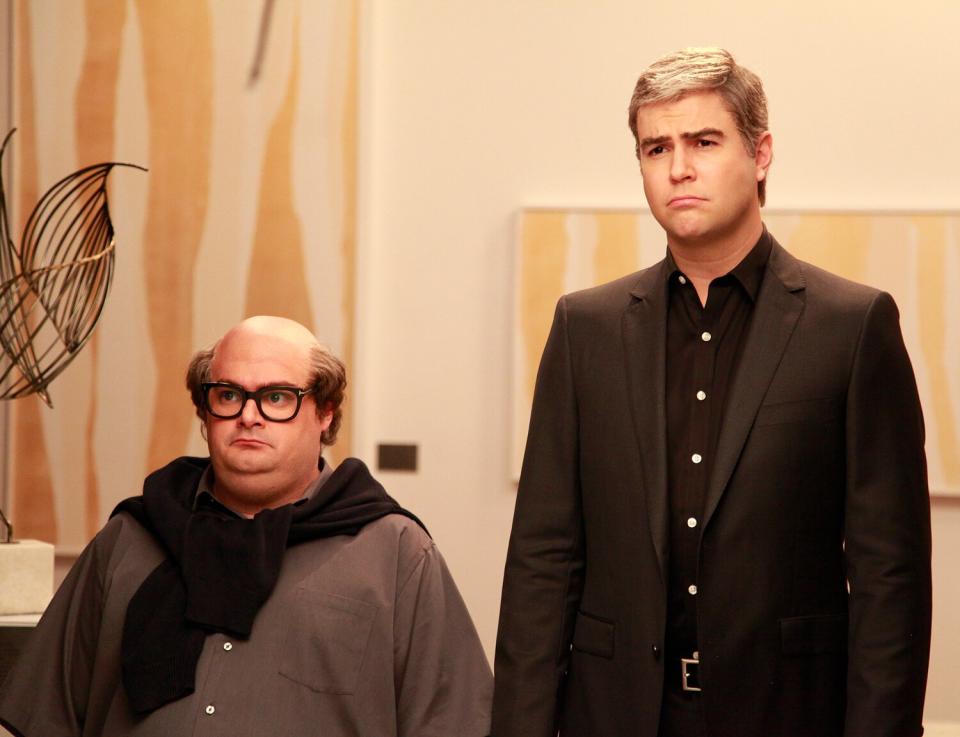 "Ryan Gosling" Episode 1690 -- Pictured: (l-r) Bobby Moynihan as Danny DeVito and Taran Killam as George Clooney during the "Nespresso" sketch on December 5, 2015