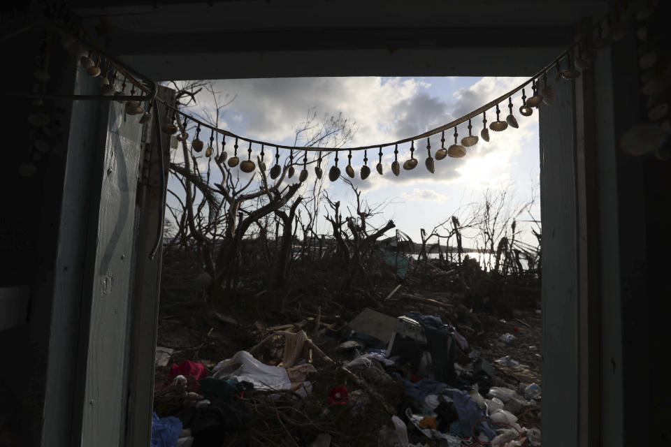 Destruction caused by Hurricane Dorian is seen in Eastern Shores just outside of Marsh Harbor, Abaco Island, Bahamas, Saturday, Sept. 7, 2019. The Bahamian health ministry said helicopters and boats are on the way to help people in affected areas, though officials warned of delays because of severe flooding and limited access. (AP Photo/Fernando Llano)