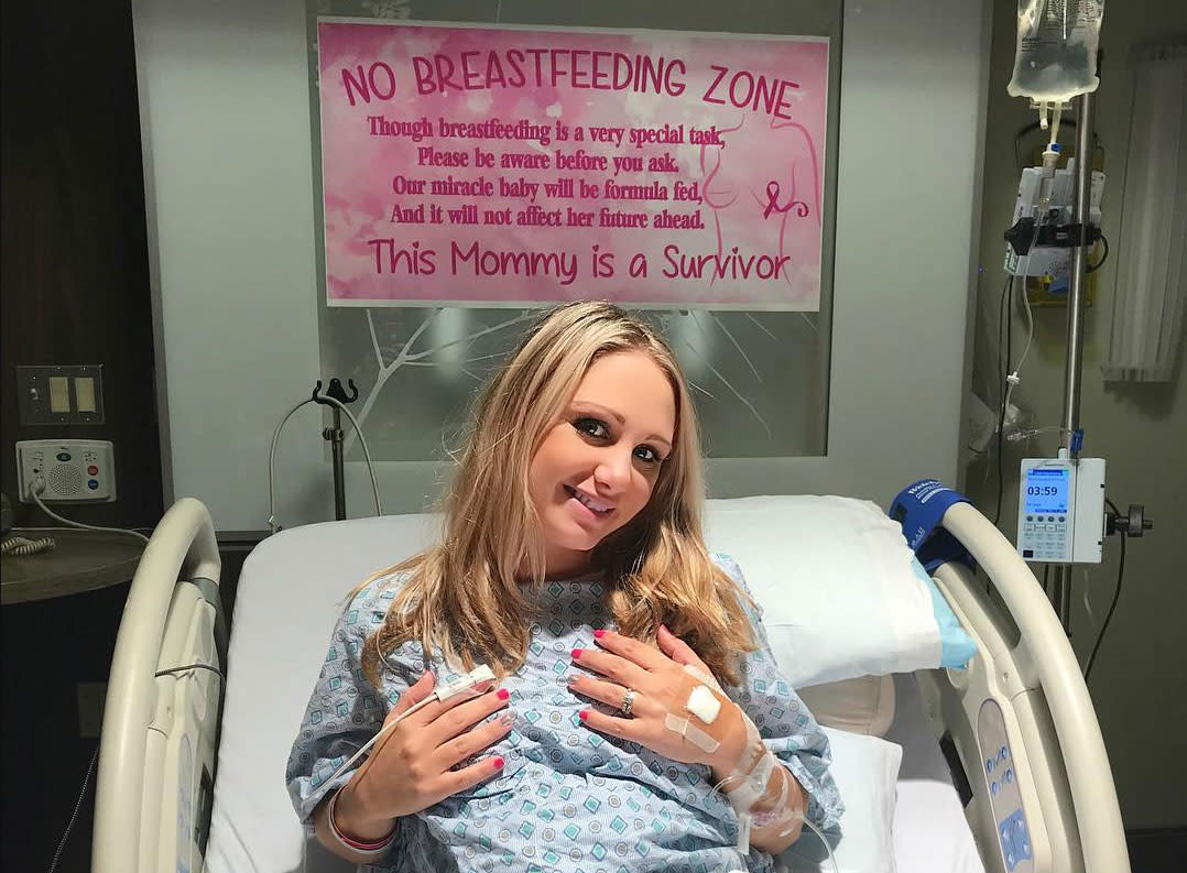 Meghan Koziel created a “No Breastfeeding Zone” sign to alert medical staff to the fact that she’s a breast cancer survivor. (Photo: meghankoziel)