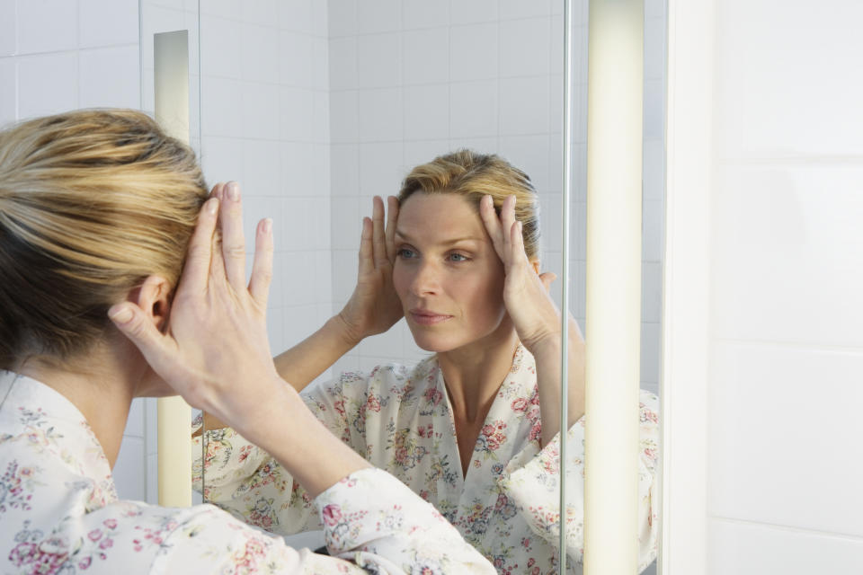 Some people believe taping their face of a night can help to reduce wrinkles. (Getty Images)