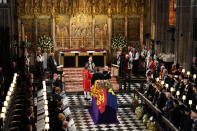 <p>The Imperial State Crown is removed from the Queen's coffin. (PA)</p> 