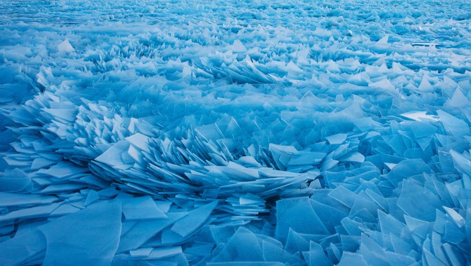 Lake Michigan is starting to melt as spring approaches, causing the ice to break apart and bunch together in a stunning display of ice shards.