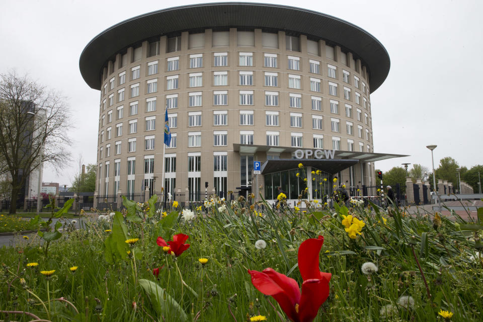 -FILE- In this Friday, April 21, 2017, image the headquarters of the Organisation for the Prohibition of Chemical Weapons, OPCW, are seen in The Hague, Netherlands. Russia came under renewed pressure to explain the nerve agent attack on opposition figure Alexei Navalny as the annual meeting of the global chemical weapons watchdog got underway Monday Nov. 30, 2020, amid measures aimed at reining in the spread of the coronavirus. (AP Photo/Peter Dejong)