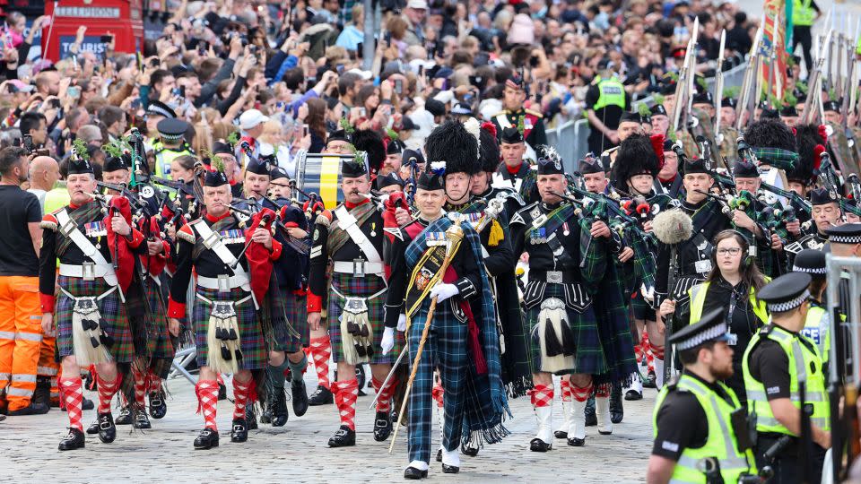 The Combined Cadet Force Pipes and Drums and the Cadet Military Band proceed down Edinburgh's Royal Mile on July 5, 2023. - Chris Jackson/Getty Images