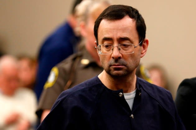 Former Michigan State University and USA Gymnastics doctor Larry Nassar  in Ingham County Circuit Court on January 24, 2018 in Lansing, Michigan.  - Credit: JEFF KOWALSKY/AFP/Getty Images