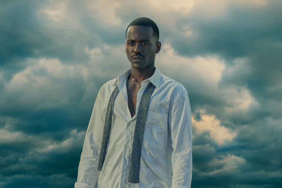 Ncuti Gatwa wearing a shirt and tie against a moody backdrop as he makes his Doctor Who debut in The Power Of The Doctor. (BBC)