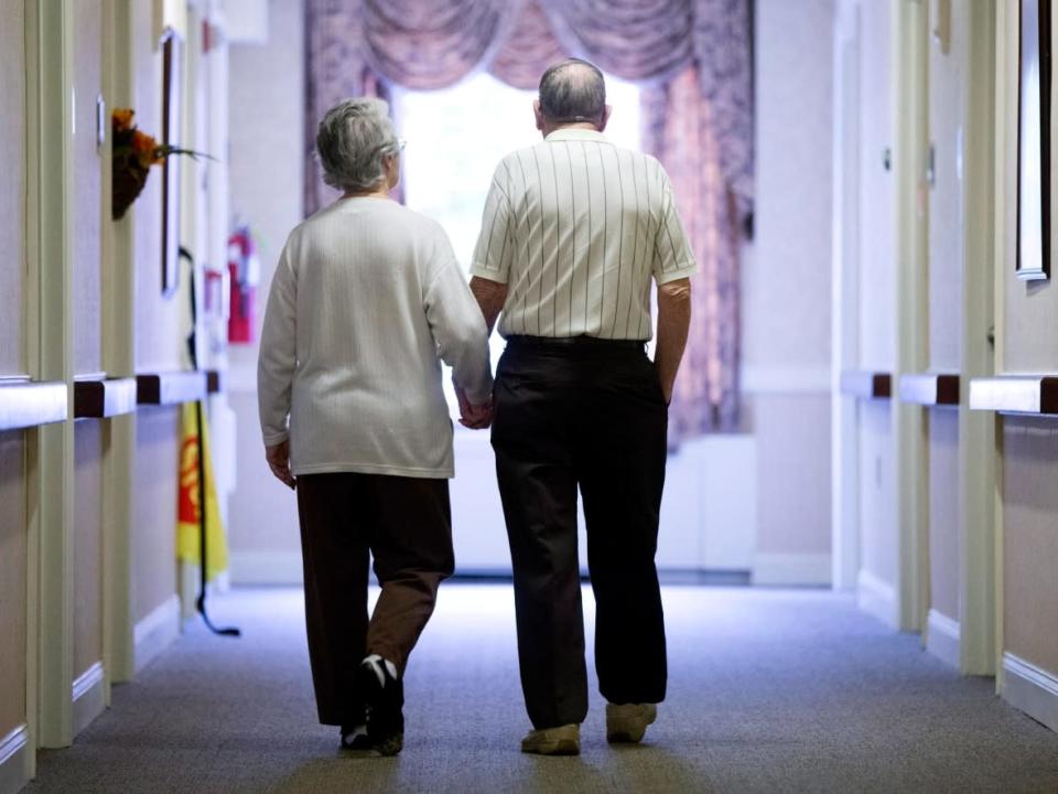 Some long-term care homes are closing to designated caregivers to prevent potential exposures of the Omicron variant, which could devestate residents and staffing. (The Associated Press - image credit)