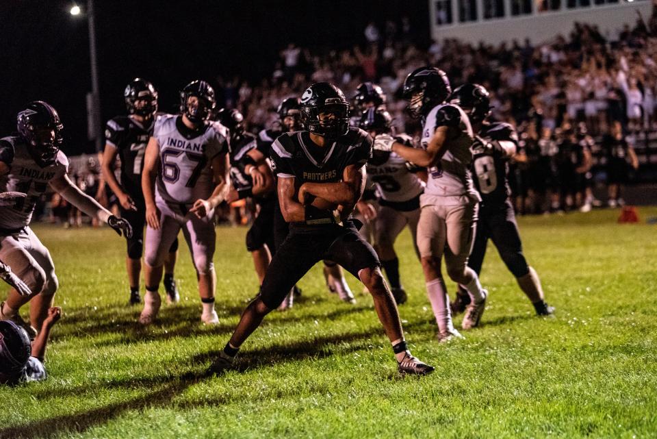 Centralia running back Kyden Wilkerson scores the go-ahead touchdown late in the Panthers' 26-20 win over Hallsville on Friday night.