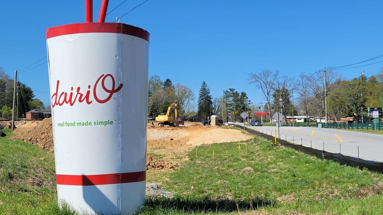 Construction workers continue work on the new Dairi-O, which will be located across the road from East Henderson High School on Upward Road.