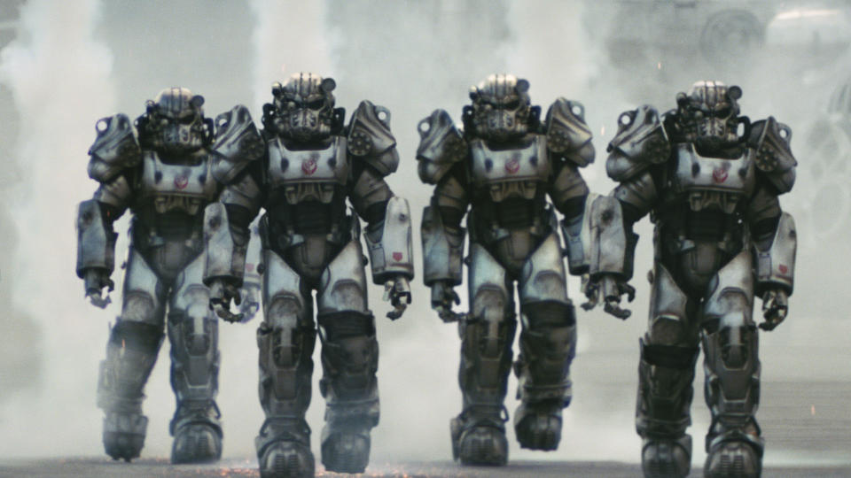 Four members of the Brotherhood of Steel walk towards the camera in the Fallout TV show
