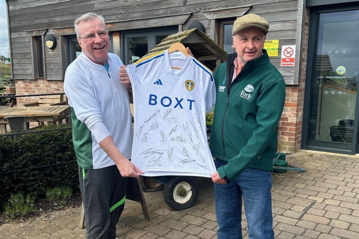 1.	Chris Mitchell from Lavender Fields Care Village and Karl Avison with the signed Leeds United shirt Chris Mitchell and Karl Avison <i>(Image: Pic supplied)</i>