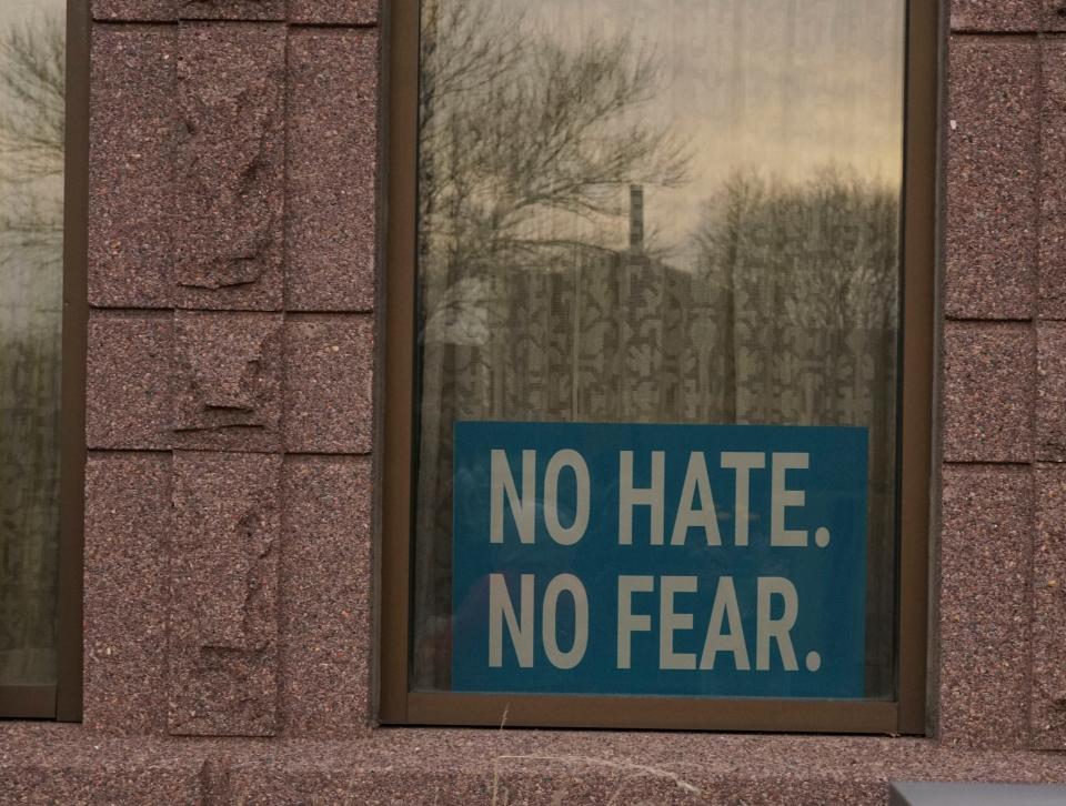 A “No Fear, No Hate” sign hangs in the window of the First Congregational Church in Sioux Falls. Members of the community rallied in the church parking lot against anti-Semitic hate on Sunday, Dec. 5, 2021.