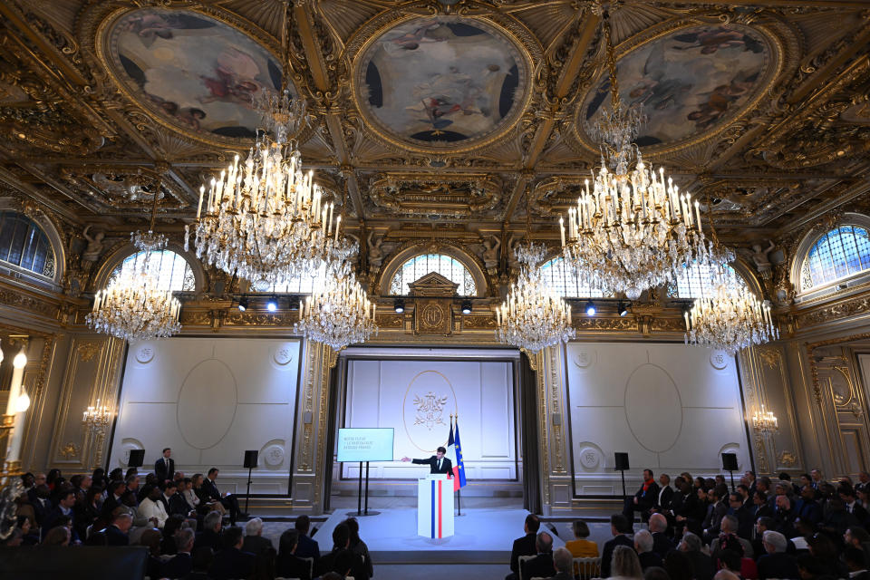 French President Emmanuel Macron delivers a speech ahead of his visit in Central Africa, at the Elysee Palace in Paris, Monday, Feb. 27, 2023. French President Emmanuel Macron unveiled his country's changing economic and military strategy in Africa for the coming years, as France's influence substantially declines on the continent. Macron begins an ambitious Africa trip on Wednesday to Gabon, Angola, the Republic of Congo and Congo.( Stefano Rellandini, Pool via AP)