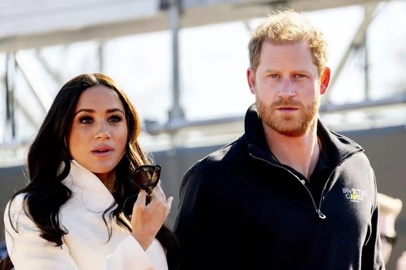 Prince Harry and his wife Meghan Markle