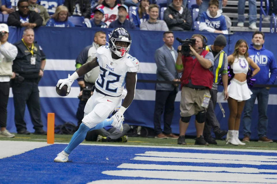 Tennessee Titans running back Tyjae Spears (32) runs into the end zone for a touchdown against the Indianapolis Colts during the second half of an NFL football game, Sunday, Oct. 8, 2023, in Indianapolis. (AP Photo/Michael Conroy)
