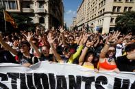 People gather for a protest in Barcelona