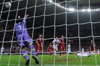 Portuguese forward Cristiano Ronaldo (R) heads to score past Czech goalkeeper Petr Cech during the Euro 2012 football championships quarter-final match the Czech Republic vs Portugal at the National Stadium in Warsaw. Portugal won 1-0