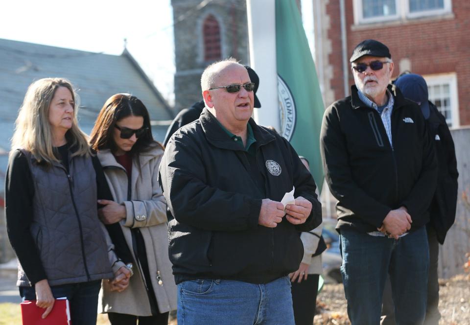 Dover Mayor Bob Carrier speaks to family and friends of late Capt. Jack Casey during a flag ceremony outside City Hall Saturday, Feb. 10, 2024.
