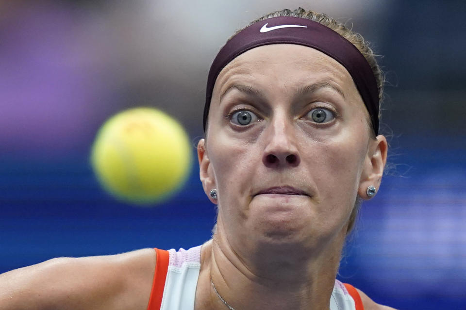 Petra Kvitova, of the Czech Republic, eyes a return to Jessica Pegula, of the United States, during the fourth round of the U.S. Open tennis championships, Monday, Sept. 5, 2022, in New York. (AP Photo/Julia Nikhinson)