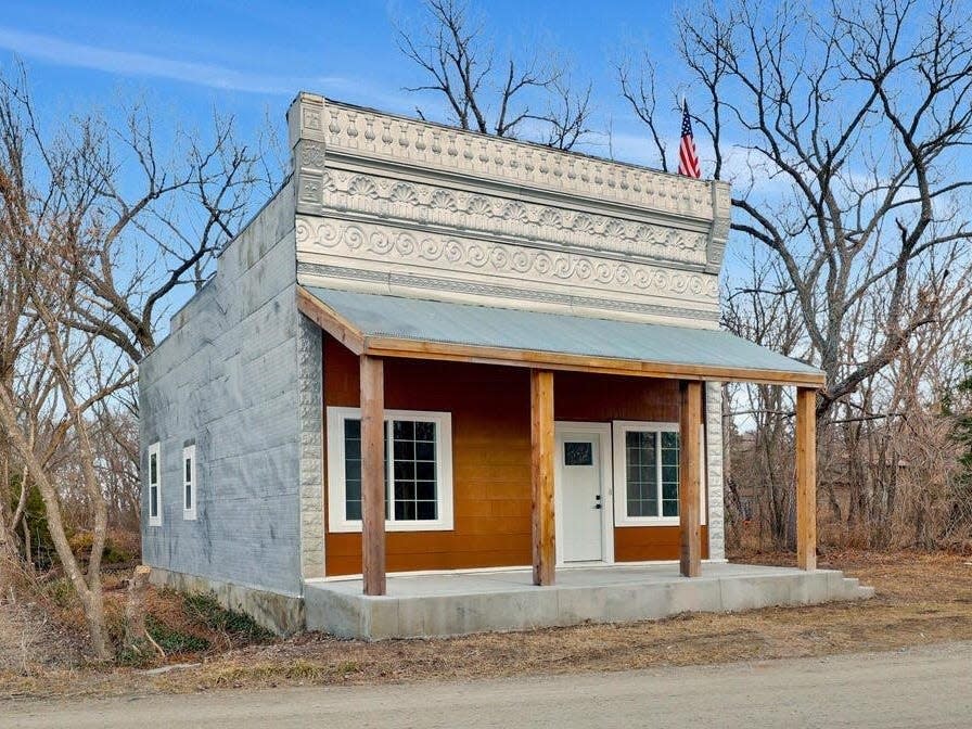 The exterior of the former post office at 1513 G Rd in Clements, Kansas.