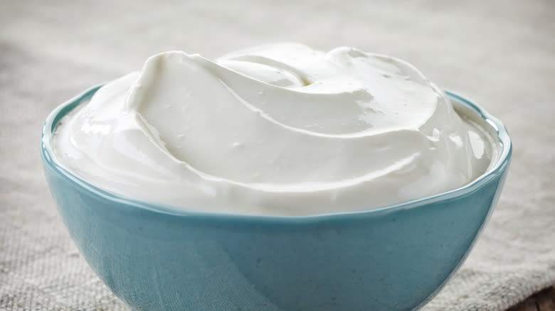 Sour cream in blue bowl