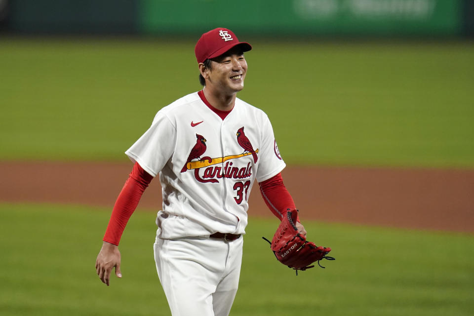 St. Louis Cardinals starting pitcher Kwang-Hyun Kim smiles as he walks off the field after getting Milwaukee Brewers' Ryan Braun to fly out ending the top of the fifth inning of a baseball game Thursday, Sept. 24, 2020, in St. Louis. (AP Photo/Jeff Roberson)