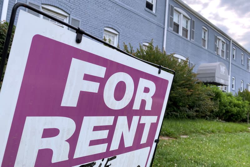 FILE PHOTO: A "For Rent" sign is displayed in front of an apartment building in Arlington, Virginia, U.S.