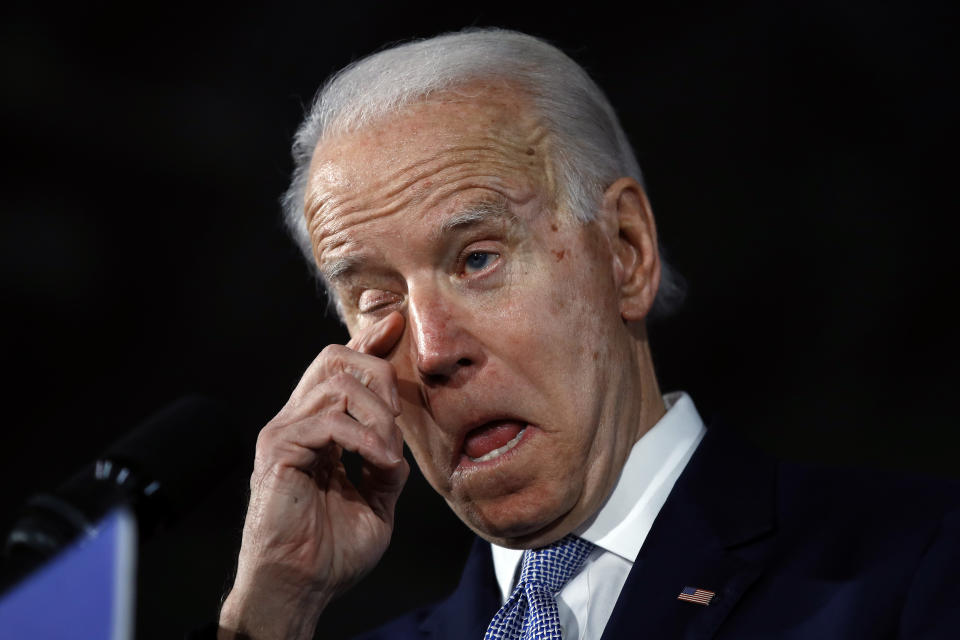 Democratic presidential candidate former Vice President Joe Biden wipes his eye as he speaks at a primary night election rally in Columbia, S.C., Saturday, Feb. 29, 2020, after winning the South Carolina primary. (AP Photo/Matt Rourke)