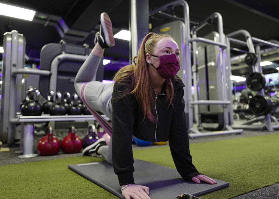 FALMOUTH, ENGLAND - APRIL 12: Club member Francesca Williams, aged 20, returns to the gym at the St Michael's Health Club shortly after 6am on April 12, 2021 in Falmouth, England. England has taken a significant step in easing its lockdown restrictions, with non-essential retail, beauty services, gyms and outdoor entertainment venues among the businesses given the green light to re-open with coronavirus precautions in place. Pubs and restaurants are also allowed open their outdoor areas, with no requirements for patrons to order food when buying alcoholic drinks. (Photo by Hugh Hastings/Getty Images)