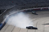 Carson Ware gets sideways as he comes out of Turn 4 in a NASCAR Xfinity Series auto race Saturday, Sept. 4, 2021, in Darlington, S.C. (AP Photo/John Amis)