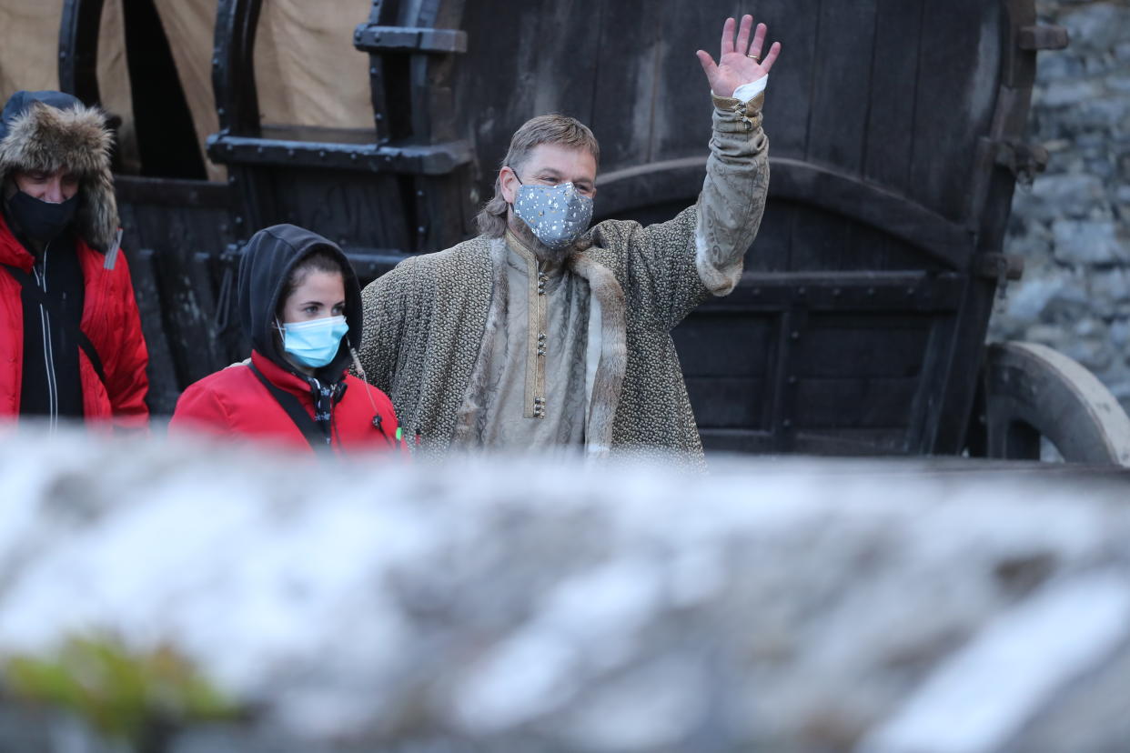 Matt Damon waves to the crowd as he leaves the set of the Last Duel, an historical drama-thriller film directed by Ridley Scott, at Cahir Castle in Co Tipperary.