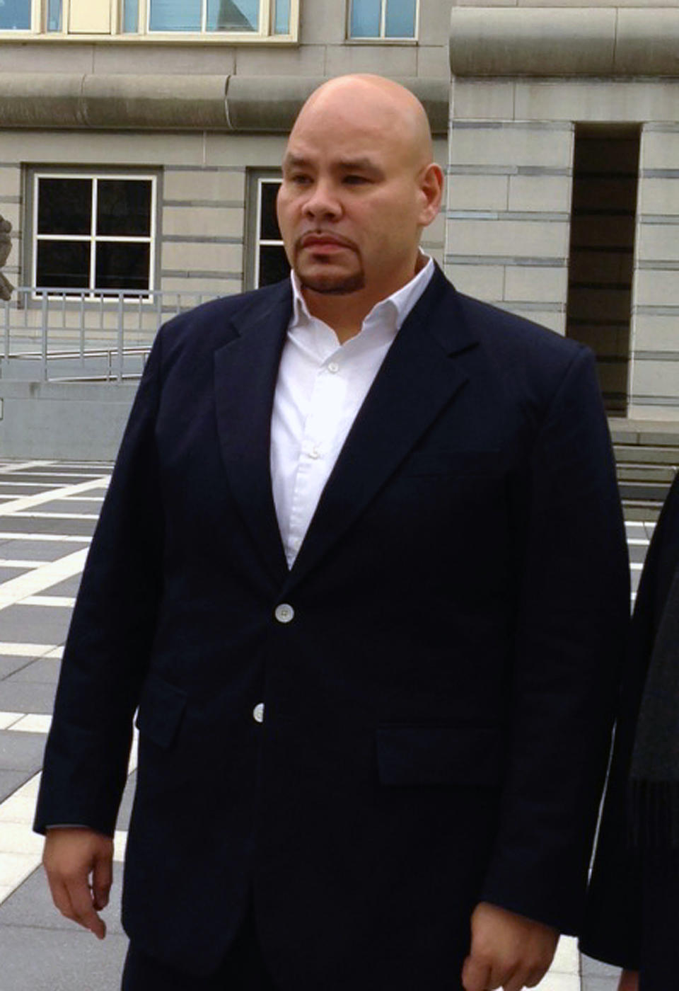 FILE - This Dec. 20, 2012 file photo shows rapper Fat Joe, whose real name is Joseph Cartagena, leaving court in Newark N.J. Cartagena is being sentenced sentenced Monday, June 24, in federal court after he pleaded guilty in December 2012 to failing to pay taxes on more than $1 million of income in 2007 and in 2008. The Miami Beach resident was prosecuted in New Jersey because some of the companies he earns money from are incorporated in Somerville. (AP Photo/Samantha Henry, file)