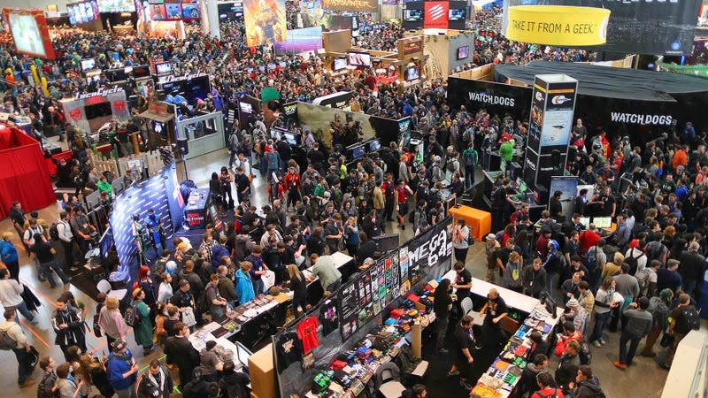 A large group of people milling about on the show floor of PAX East 2013