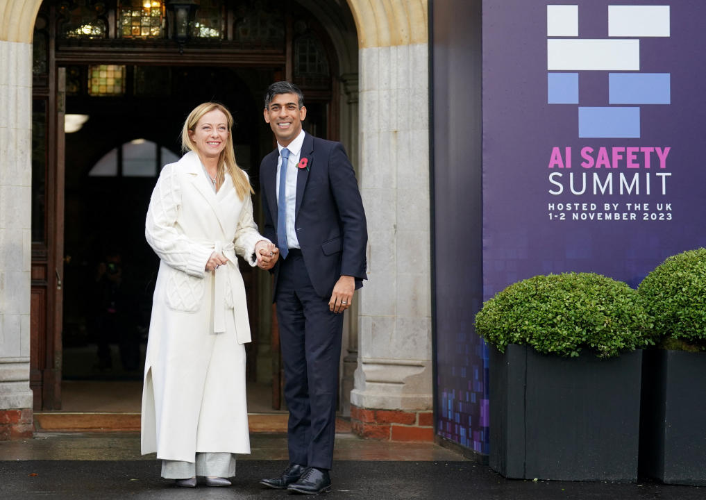 Britain's Prime Minister Rishi Sunak welcomes Italy's Prime Minister Giorgia Meloni during the UK Artificial Intelligence (AI) Safety Summit at Bletchley Park in Milton Keynes, Buckinghamshire, Britain November 2, 2023.  Joe Giddens/Pool via REUTERS