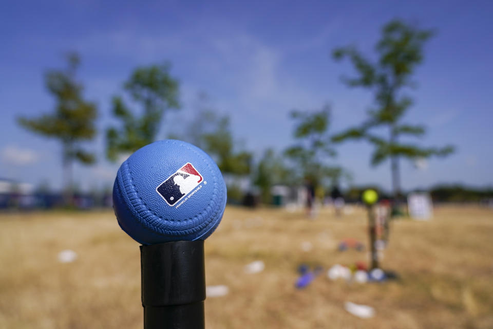 An MLB baseball at the MLB First Pitch Festival, at the Queen Elizabeth Olympic Park, in London, Thursday, June 22, 2023. Britain's relative success at the World Baseball Classic and the upcoming series between the Chicago Cubs and St. Louis Cardinals has increased London's interest about baseball. The sport's governing body says it has seen an uptick in interest among kids. (AP Photo/Alberto Pezzali)