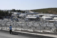 A view of the new multi-purpose reception and identification migrant centre which was constructed near Vathy town, on the eastern Aegean island of Samos, Greece, Saturday, Sept. 18, 2021. The centre constructed following a 121 million euros agreement between the European Commission and the Greek Ministry of Migration and Asylum, an amount granted to Greece for the construction of 3 reception centres on the islands of Samos, Kos, and Leros. (AP Photo/Michael Svarnias)